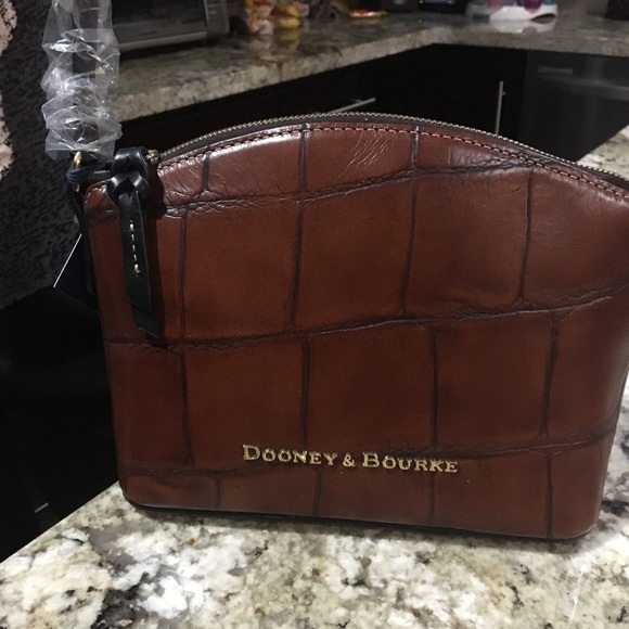 Dooney & Bourke Handbags - Dooney& bourke crossbody cognac nwt Ruby